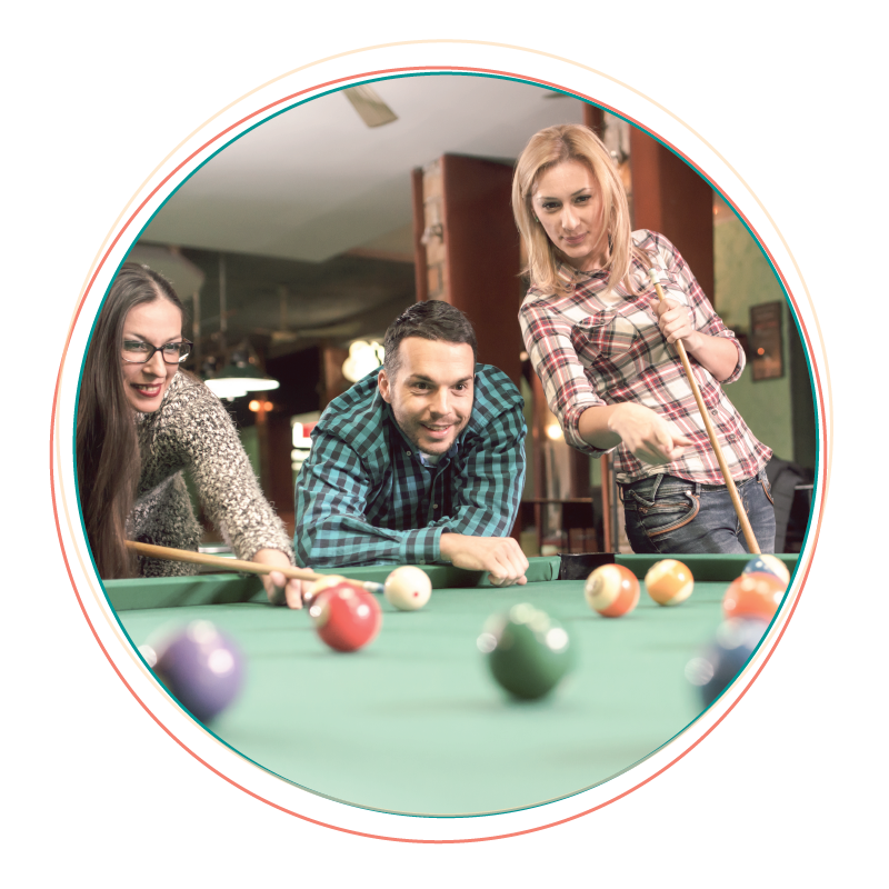 Young adults playing pool